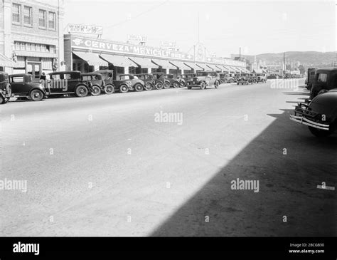 Parked cars line Main Street (Avenida Revolución) near Cantina La Ballena, also known as The ...