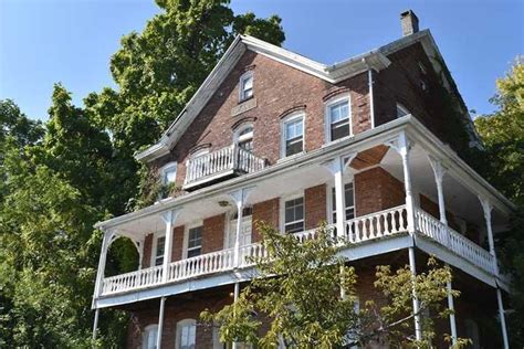 Port Ewen Brick Victorian with expansive views of the Hudson River!