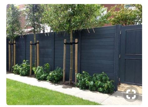 Matt black horizontal fence | Backyard fences, Fence design, Privacy fence designs