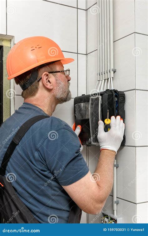 Electrical work indoors stock image. Image of equipment - 159703031