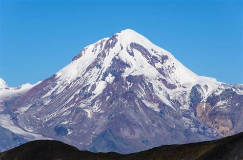 Mount Kazbek (5.034 m), the view from the pass Chaukhi (3.310 m ...