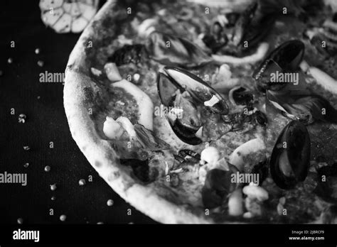 delicious italian pizza with fresh seafood Stock Photo - Alamy