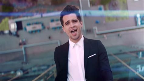 Watch Brendon Urie Casually Walk Up A Skyscraper In Panic! At The Discos High Hopes Video | Pop ...