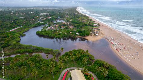 Aerial view of Imbassai beach, Bahia, Brazil. Beautiful beach in the northeast with a river and ...