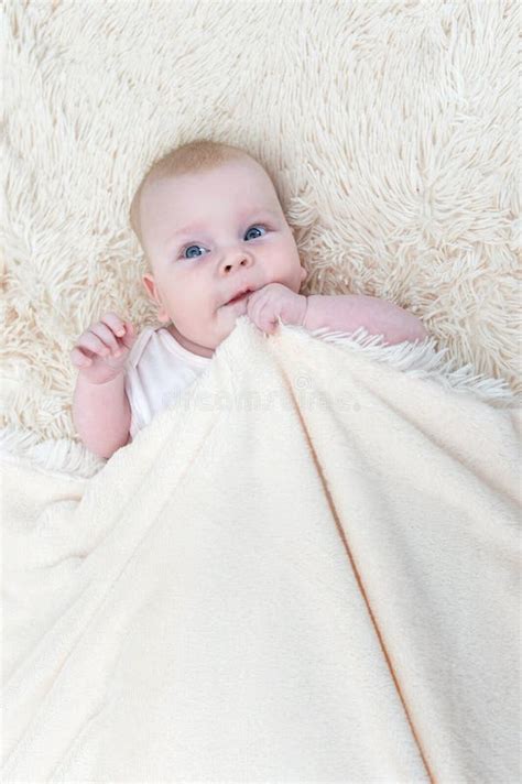 Cute Little Baby Girl Lying Under the Blanket Stock Photo - Image of cute, lying: 185551678