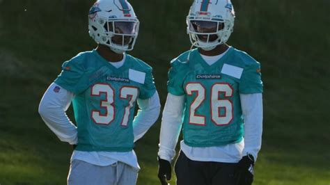 Two Miami Dolphins running backs test positive