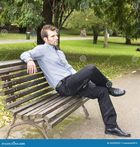 Man Sitting On A Bench In The Park. Stock Image - Image: 34294353