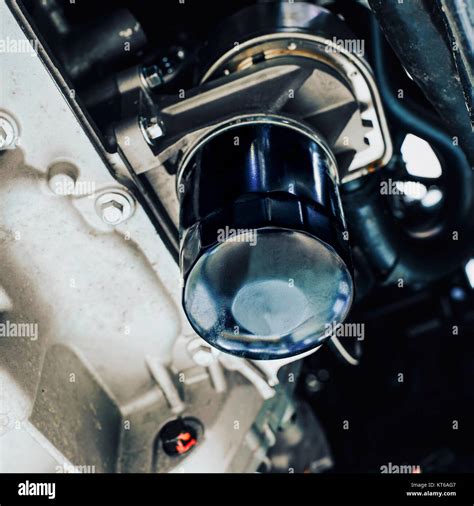 car oil filter installed Stock Photo - Alamy