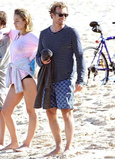 The Mentalist actor Simon Baker and his three kids at Bondi Beach