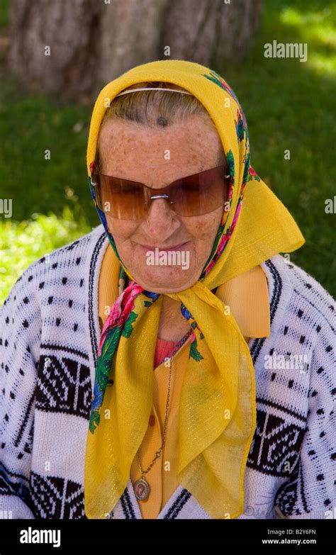 Old lady with scarf babushka portrait in park of Kiev Ukraine Stock ...