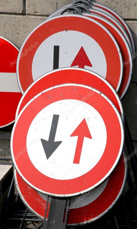 Road signs with black arrows and the Red arrows Stock Photo by ...