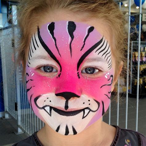 Pink tiger face paint | Tiger face paints, Face painting, Face painting designs