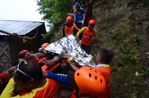 At least 14 dead, dozens missing in Naga, Cebu, landslide