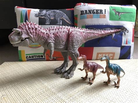 Carnotaurus (22”) +2 Velociraptors - Disney Dinosaur Playmates ...