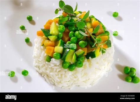 White rice with vegetables Stock Photo - Alamy