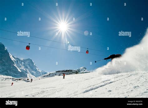 Skiing scene in Grindelwald, Switzerland, Europe Stock Photo - Alamy