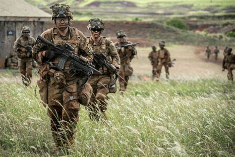 U.S. soldiers from the 25th Infantry Division move off an … | Flickr