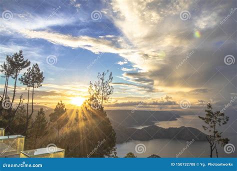 Sunrise at Lake Toba stock photo. Image of beautiful - 150732708