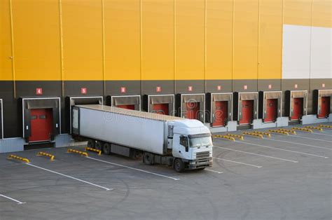 Unloading Trucks at a Modern Warehouse Complex Stock Photo - Image of plant, commercial: 166518192