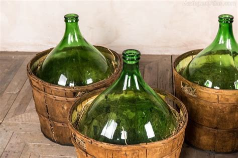 Antiques Atlas - Large Vintage Wine Bottles In Barrels