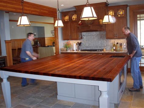 Extra large kitchen island with an edge grain walnut butcher block wood countertop. | Wood ...