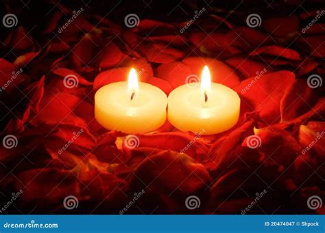 Candles on rose petals stock image. Image of macro, candle - 20474047