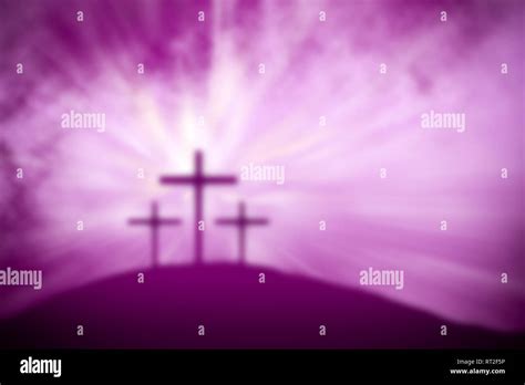 religious easter purple lent background with magical blurred crosses on ...