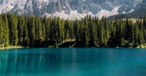 A Breathtaking View of the Latemar Mountain Range from Lake Carezza ...