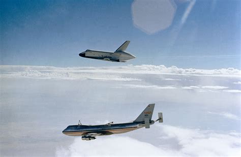 NASA's Space Shuttle Endeavour (STS-68) "receives a high-flying salute from its sister shuttle ...