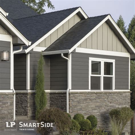LP SmartSide trim, lap and panel siding pair with horizontal stonework to create dimension and ...