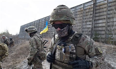 Ukraine's Territorial Defense volunteers prepare to support army in ...