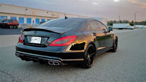 2012 Mercedes-Benz W218 CLS63 AMG on R22 black wheels | BENZTUNING