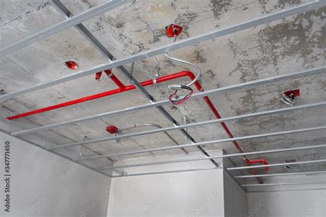 Metal ceiling grid,Acoustical ceiling grid system on drywall ภาพถ่ายสต็อก | Adobe Stock