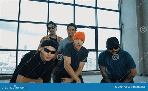 Multicultural Hipster Looking at Camera while Perform Break Dancing. Endeavor. Stock Photo ...