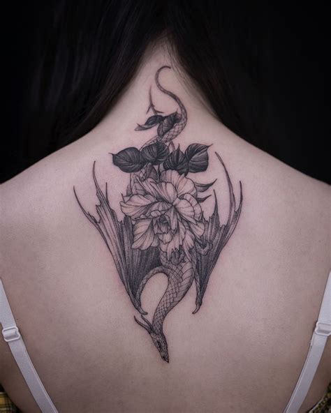 Dragon with flowers tattoo | Tattoos, Beautiful tattoos, Dragon tattoo ...