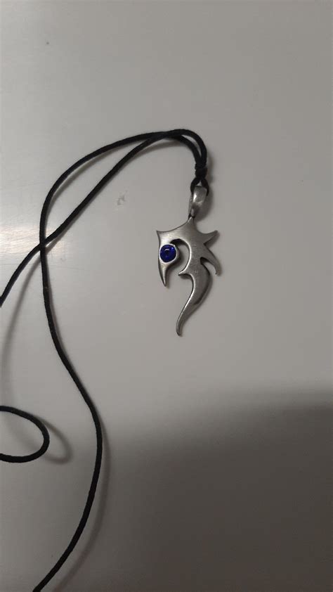 What is this symbol on this necklace or is it just random? I got it of a marketplace when i was ...