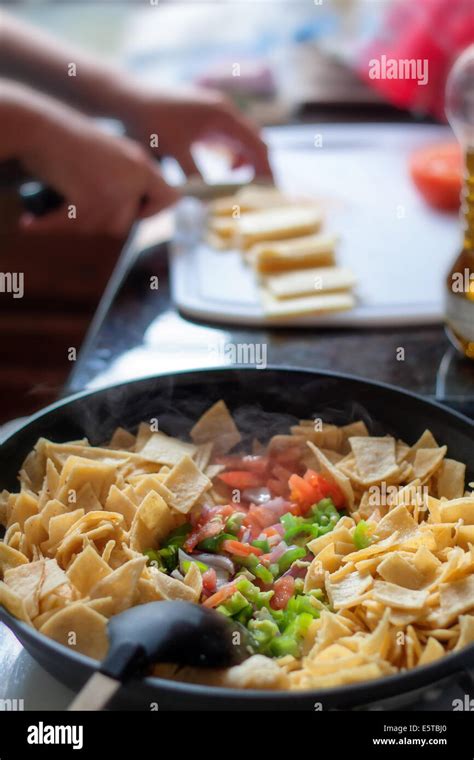 Cooking Chilaquiles, a traditional Mexican dish Stock Photo - Alamy