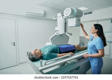 Male Patient Lying On Bed While库存照片2197537741 | Shutterstock