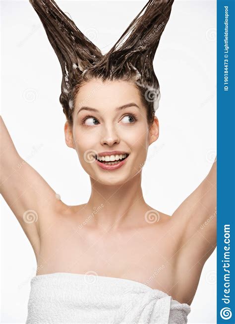 Happy Girl Looking Away while Washing Long Hair Stock Image - Image of ...