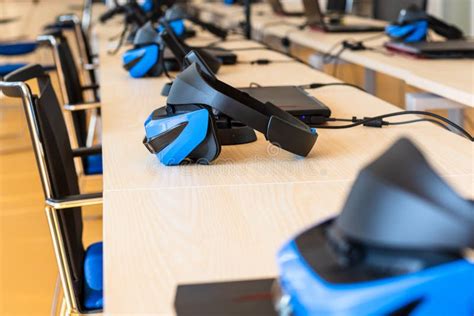 Close Up of a Virtual Reality VR Sets in a Classroom - Headset, Controller and Computer. Stock ...