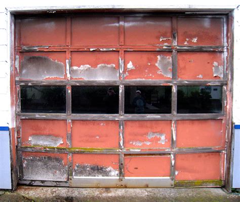 How Do You Know When It Is Time To Replace Your Old Garage Door?