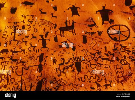 Variety of cave paintings and primitive art depicting people animals Stock Photo: 3227755 - Alamy