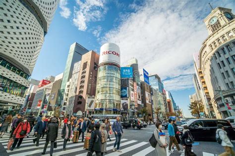 Ginza Shopping District And Pedestrian Crossing The Street At Ginza ...