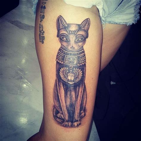 Egyptian hieroglyphs and cat tattoo in black - Tattooimages.biz