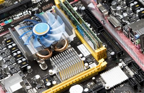 "Cpu cooler on motherboard" Stock photo and royalty-free images on Fotolia.com - Pic 131048679