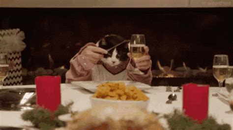 Christmas Dinner GIF - ChristmasDinner Cat Cute - Discover & Share GIFs