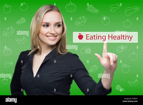 woman presses the button on virtual keyboard. touch screen. eating healthy Stock Photo - Alamy