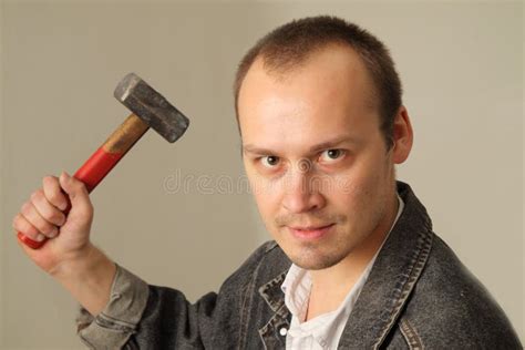 Aggressive Man with a Hammer Stock Photo - Image of confrontation, fighting: 11414176