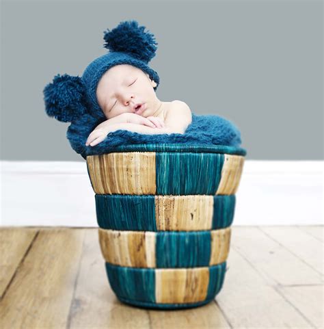 baby in a basket - Aneesa Photography