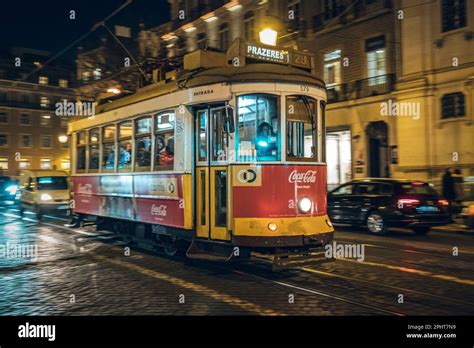 Old tram through the streets of beautiful Lisbon Stock Photo - Alamy